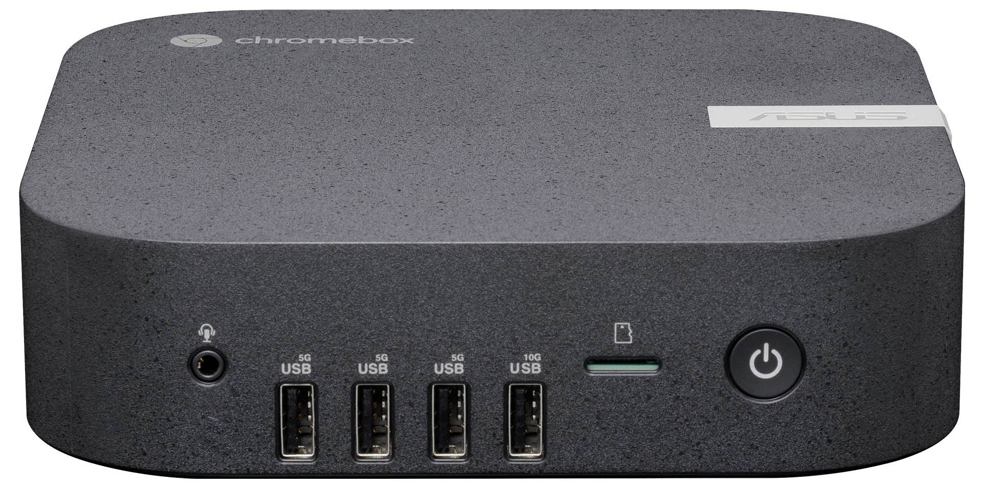 Un ordinateur noir avec quatre ports USB à l'avant, une prise casque et un interrupteur d'alimentation.