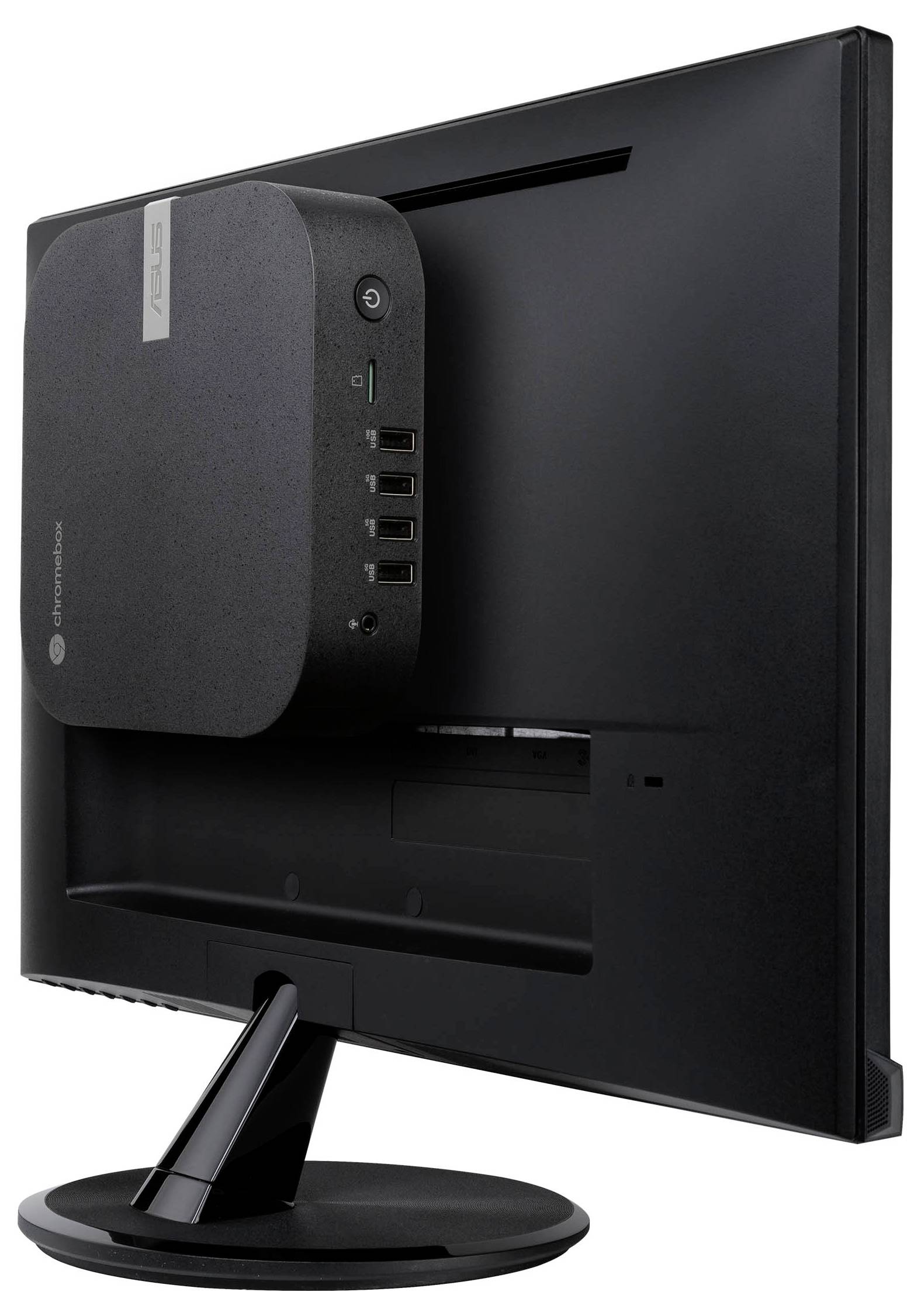 Un mini-PC est monté à l'arrière d'un moniteur. L'ordinateur dispose de plusieurs ports USB.