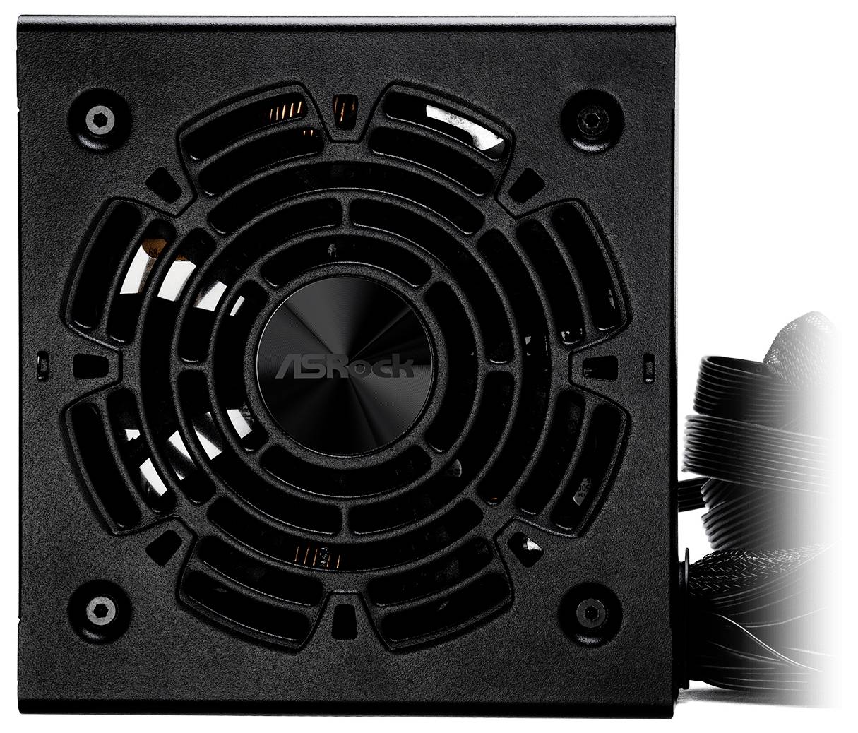 Bloc d'alimentation d'ordinateur noir avec ventilateur central, entouré de câbles gainés de noir.