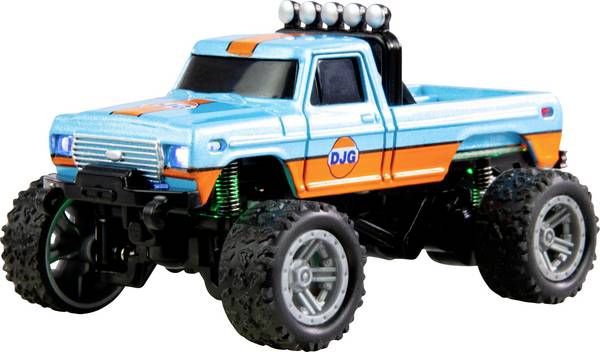 Amewi  orange brushed 1:64 Auto RC électrique Monstertruck propulsion arrière prêt à fonctionner (RtR) 2,4 GHz avec effet lumineux, avec accu et câble de charge