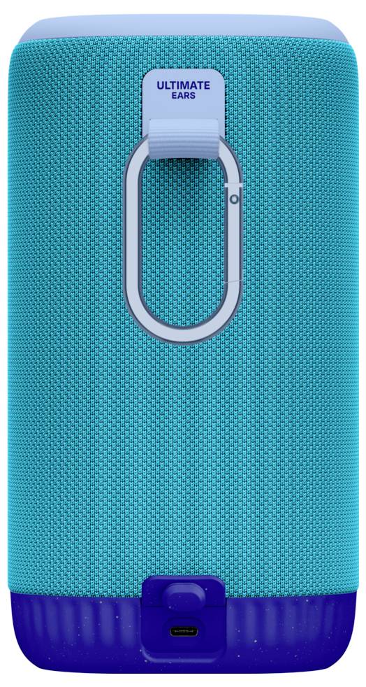 Enceinte portable Bluetooth bleue avec poignée intégrée en haut et connexion en bas, adaptée aux déplacements et à l'utilisation en extérieur.