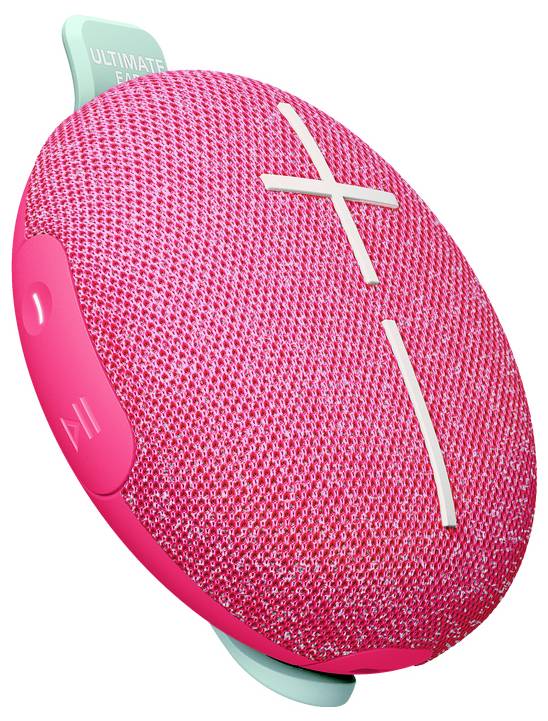 Un haut-parleur portable rose avec de grandes touches plus et moins pour régler le volume. Vue de côté avec un léger angle d'inclinaison.