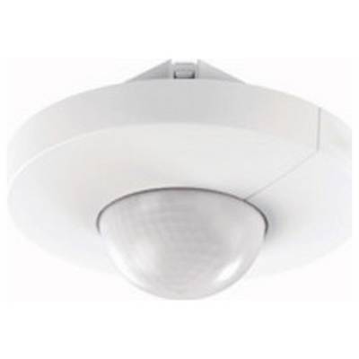 Un détecteur de mouvement blanc, rond, avec un capteur en dôme au plafond.