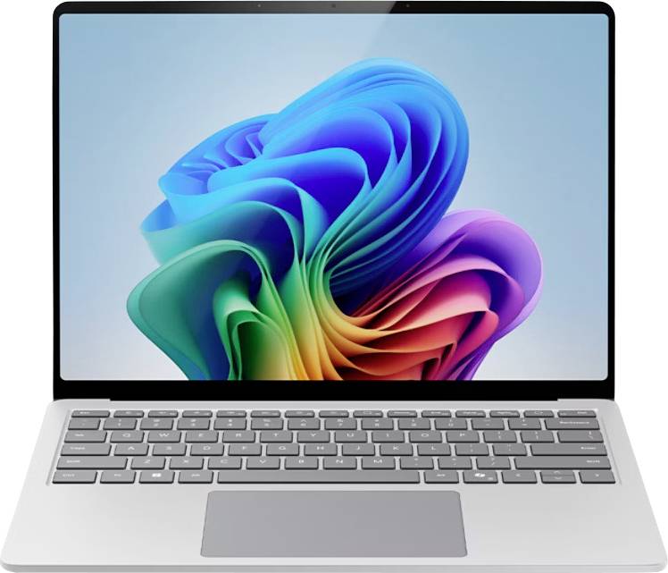 Un ordinateur portable avec un design abstrait coloré affiché sur l'écran, présentant une conception élégante et moderne avec un clavier gris.