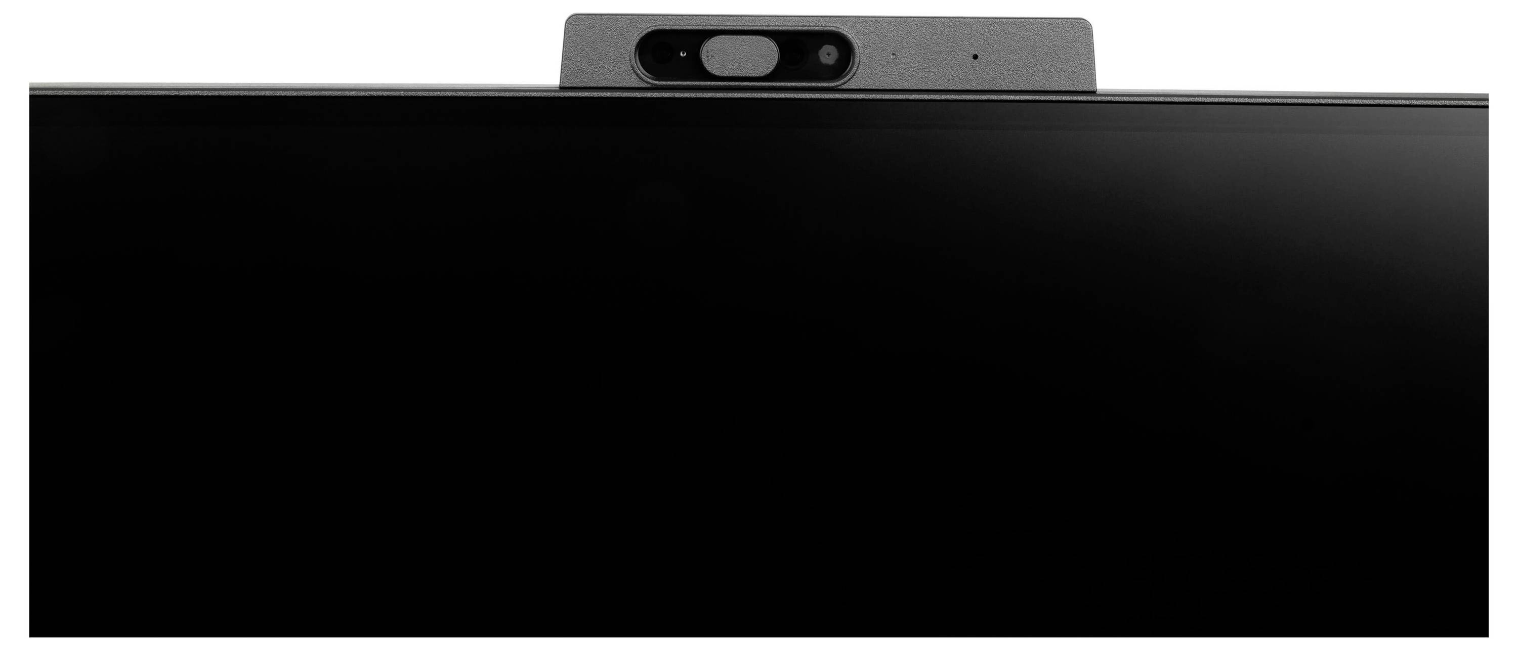 Webcam positionnée sur le bord supérieur d'un écran, montrant une petite caméra et des capteurs, typiques pour les vidéoconférences et la communication en ligne.