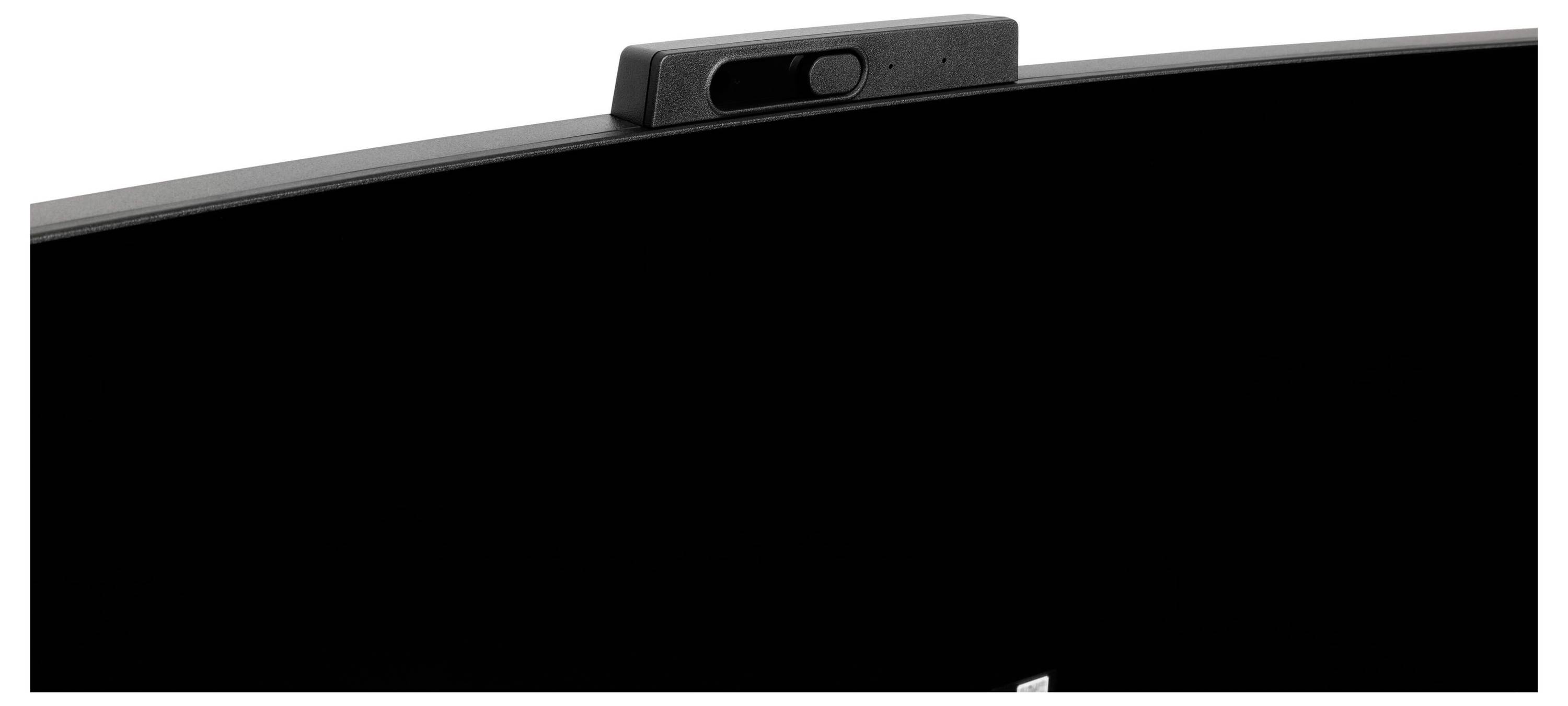 Un moniteur noir incurvé avec une petite caméra installée sur le bord supérieur.
