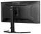 Un moniteur d'ordinateur noir de la marque G-Master Black Hawk, vu de dos. Il dispose d'un socle stable et d'un design épuré.