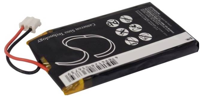Batterie lithium-ion avec câble de connexion et consignes de sécurité sur la surface.