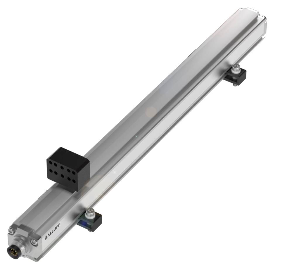 Capteur allongé avec bloc de raccordement rectangulaire, monté sur deux supports ; utilisé pour la détection de position dans les machines.