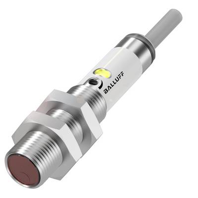 Un capteur de proximité cylindrique avec câble, boîtier en acier inoxydable et indicateur LED jaune affiche l'état de fonctionnement. Logo Balluff visible.