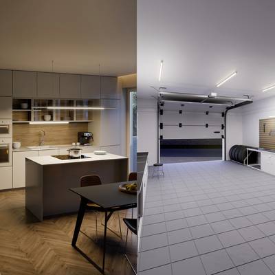 Intérieur moderne : À gauche, une cuisine avec un îlot central et des détails en bois, à droite un garage propre avec des portes ouvertes et un sol gris.