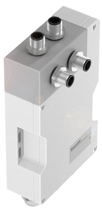 Un appareil technique rectangulaire gris et blanc avec quatre raccords cylindriques sur le dessus.