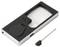 « Une loupe rectangulaire en métal avec un couvercle coulissant, accompagnée d'un petit tournevis noir adjacent, le tout sur un fond blanc. »