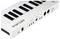 Un clavier MIDI blanc avec des touches noires, des connexions USB et MIDI. Le nom de marque 'Arturia' visible sur le côté.