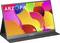 Un moniteur portable avec un écran coloré et le texte 'ARZOPA 15.6 FHD 1080P' affiché à l'écran, posé sur un support.