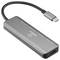 Un hub USB-C élégant et métallique avec plusieurs ports, comprenant un port HDMI et un port USB-A. Le câble est attaché pour une connectivité facile.