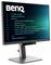 Un moniteur d'ordinateur BenQ affichant un extrait de code pour la gestion des balises publicitaires, comprenant des commandes JavaScript et des sources de script.