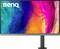 Un écran d'ordinateur affichant un design abstrait vibrant avec des couleurs tourbillonnantes de bleu, rose et orange, présentant le logo 'BenQ' dans le coin supérieur gauche.