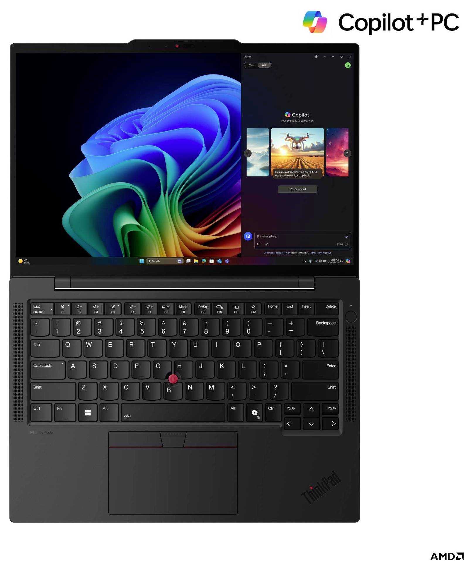 Un ordinateur portable noir avec une spirale colorée à l'écran et 'Copilot+PC' dans le coin. Le clavier et le pavé tactile sont visibles en dessous de l'écran.