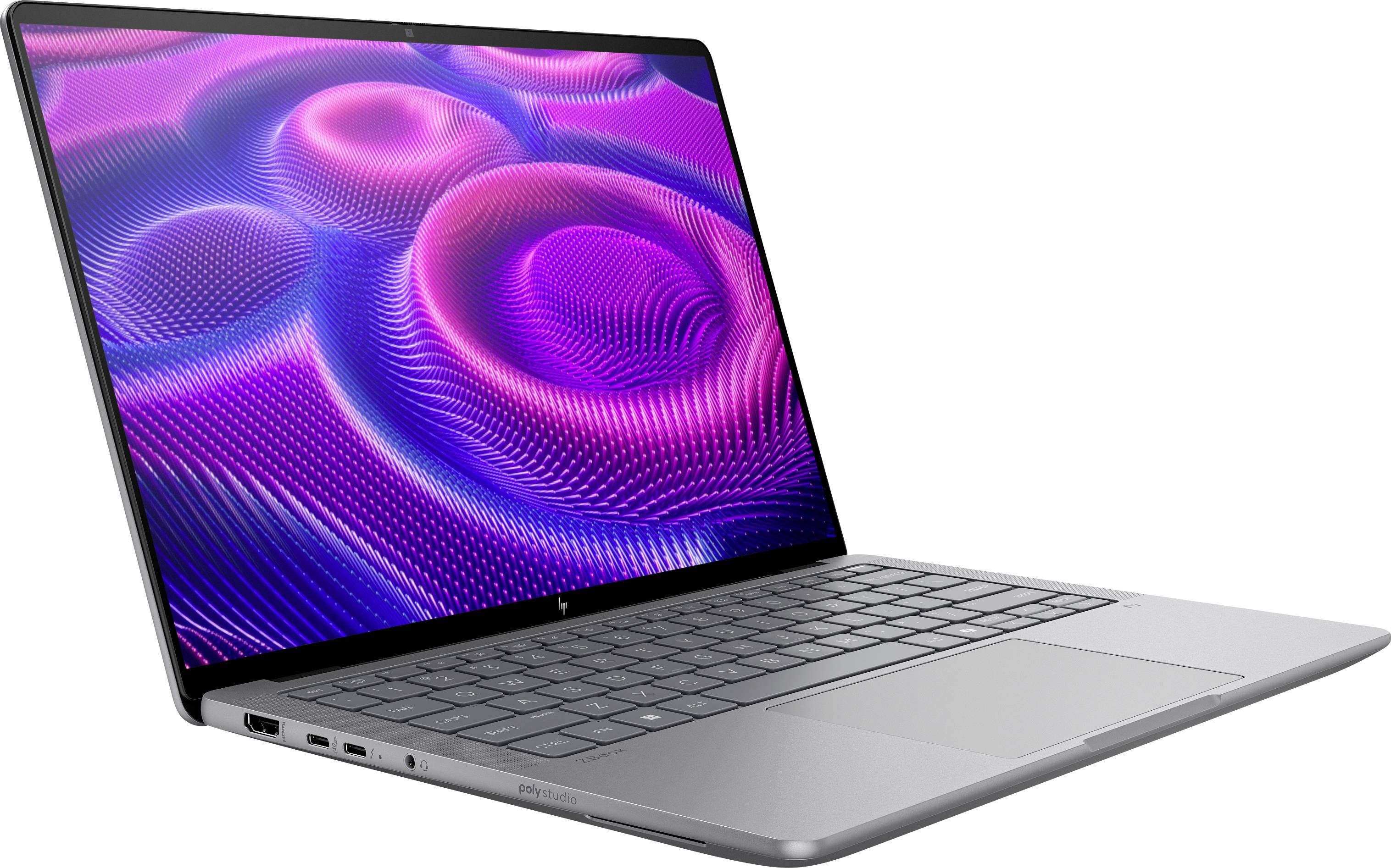 Un ordinateur portable argenté avec un motif tourbillonnant vibrant rose et violet sur l'écran, positionné en biais pour montrer le clavier et le pavé tactile.