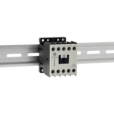 Un contacteur électrique gris monté sur un rail DIN métallique, étiqueté « 220V 50/60Hz », avec plusieurs points de connexion et un interrupteur central noir.