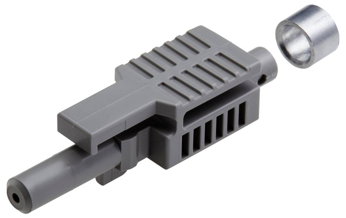 Un lanceur de fléchettes LEGO gris avec un projectile cylindrique à côté, présentant sa conception structurelle et sa fonctionnalité.