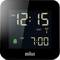 Une horloge numérique affiche '12:15 AM'. Une alarme est réglée sur '7:00 AM'. Les icônes 'DST' et de signal sont visibles.