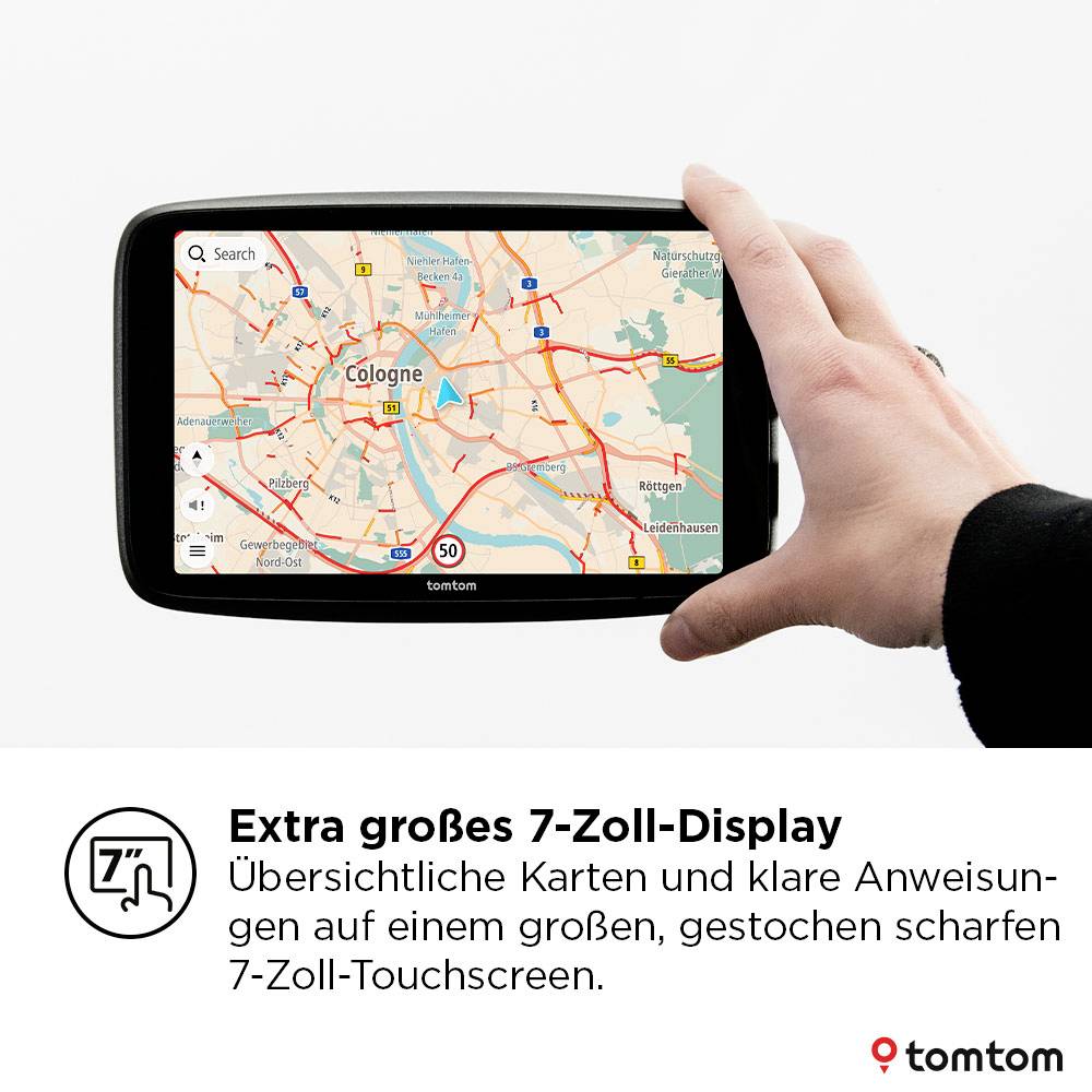 Une personne tient un appareil GPS affichant une carte avec des routes et une étiquette 'Cologne'. Légende : Grand écran de 7 pouces.