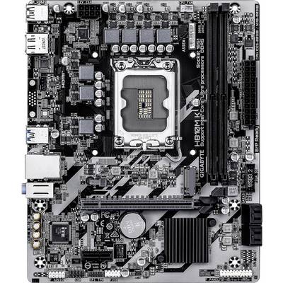 Une carte mère d'ordinateur en noir et argent comportant divers circuits, un socket de processeur au centre, des emplacements pour RAM et plusieurs ports de connexion.