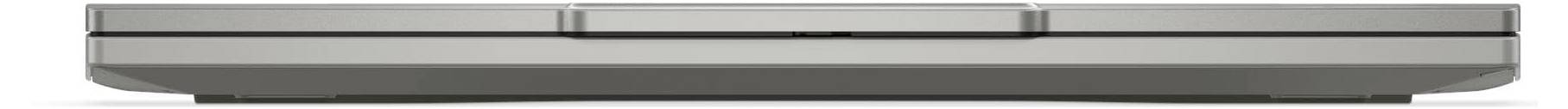 Un ordinateur portable gris fermé, vu de profil, mettant en valeur son design élégant et ses caractéristiques de portabilité.