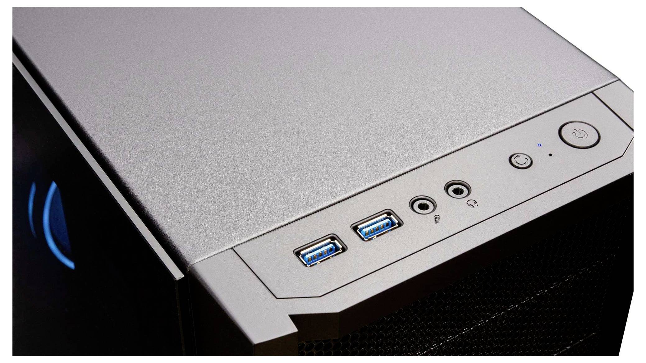 Boîtier d'ordinateur présentant deux ports USB, des prises audio et un bouton d'alimentation sur le panneau avant.