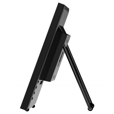 Une vue de côté d'un écran d'ordinateur plat sur un support, montrant des ports et un design élégant noir.