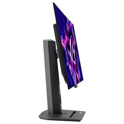 Vue latérale d'un moniteur d'ordinateur élégant affichant des graphiques abstraits vibrants en rose et bleu sur l'écran, fixé à un support robuste.
