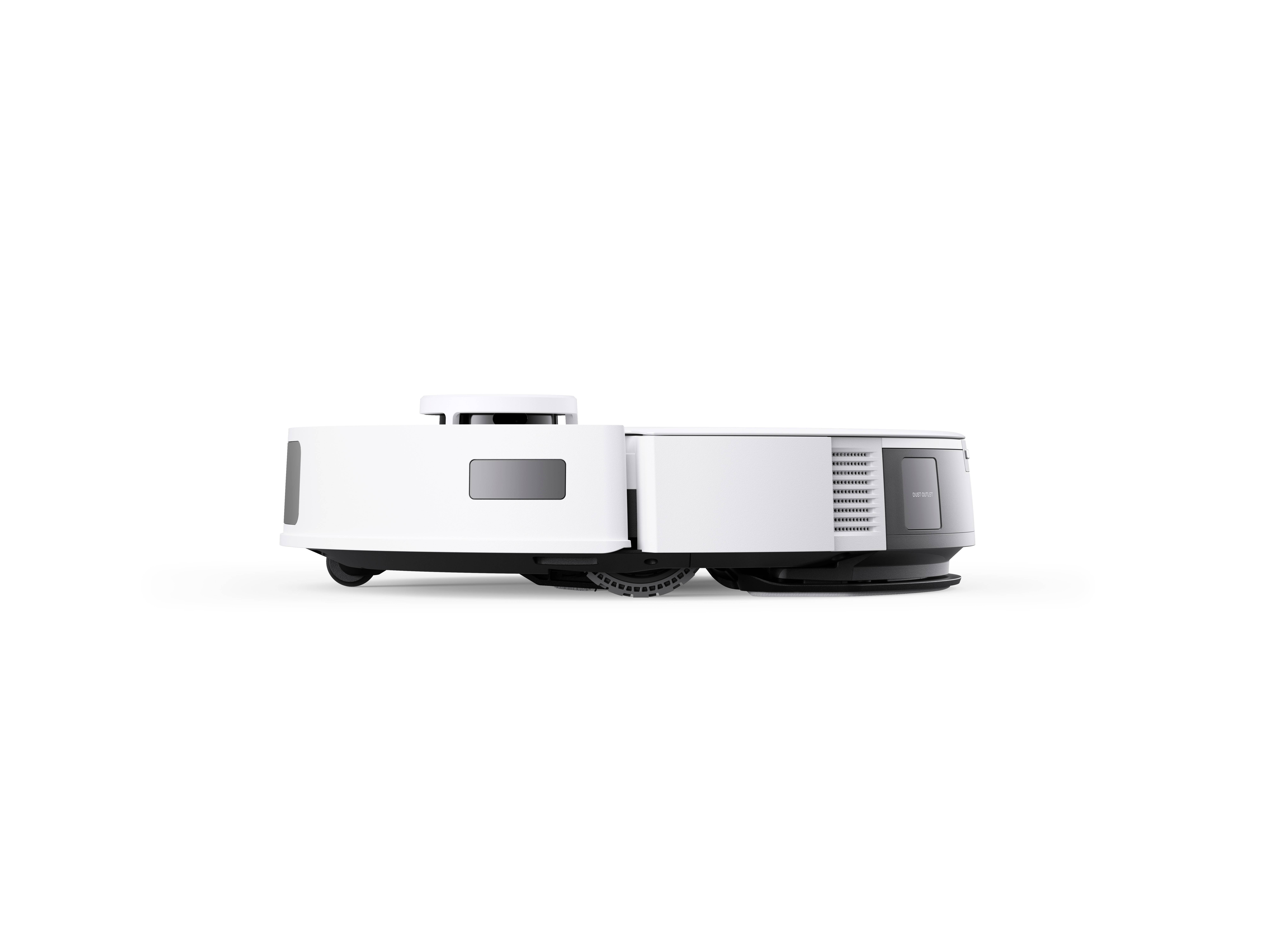 Un aspirateur robot blanc avec des capteurs sur le dessus, vu de côté, indiquant un design élégant pour le nettoyage automatisé des sols.