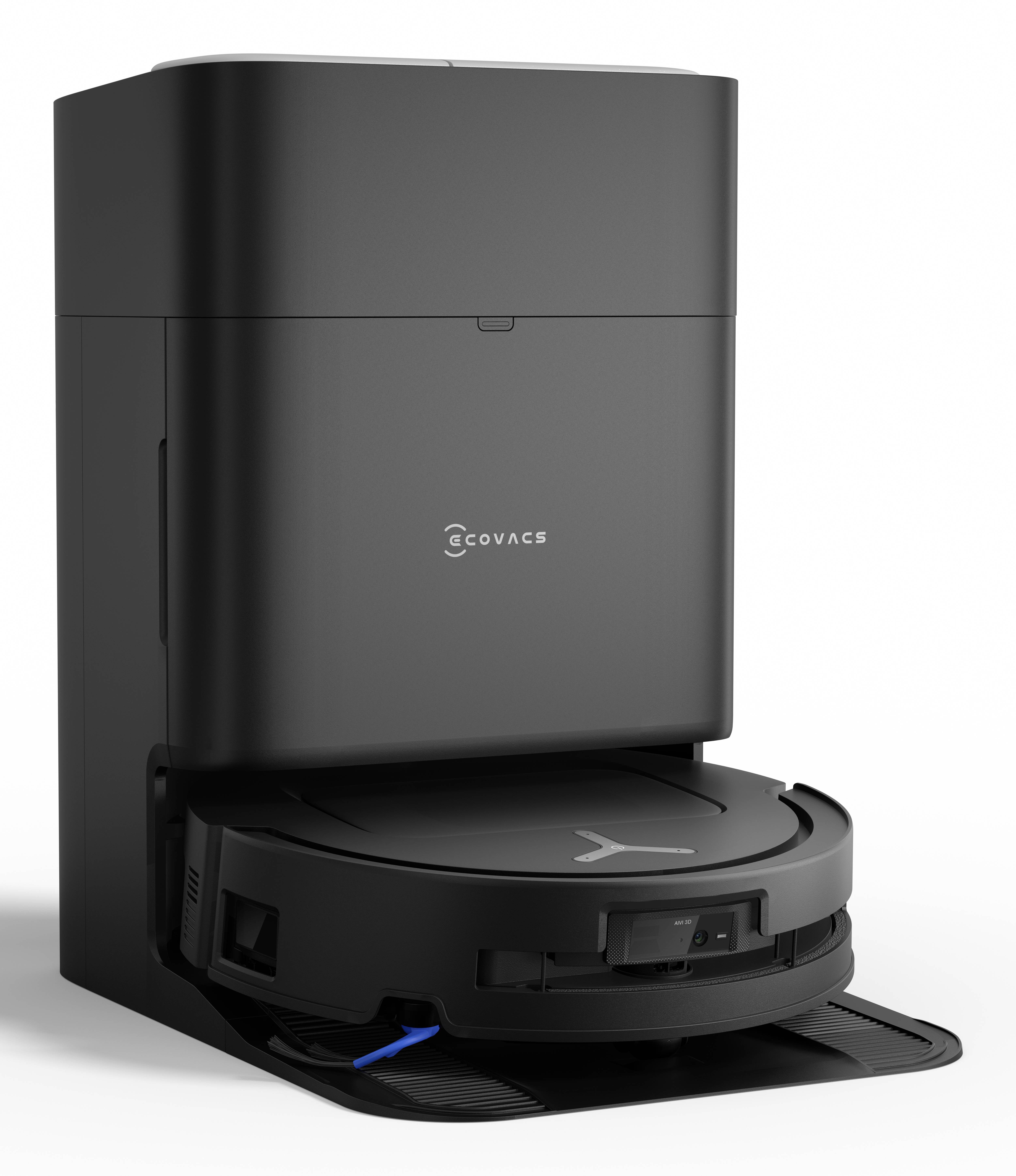 Un aspirateur robot noir avec sa base de chargement est positionné contre un fond blanc. L'appareil est de la marque 'Ecovacs'.