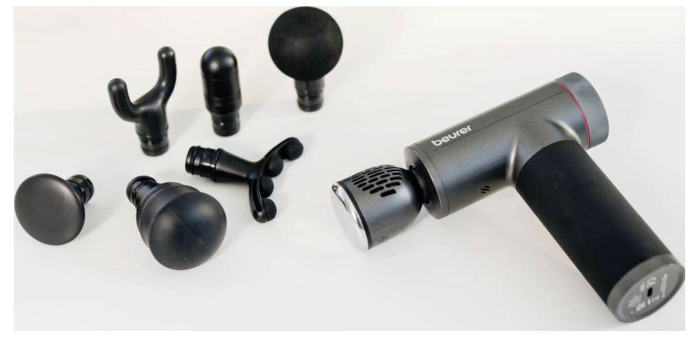 Un pistolet de massage portable doté de six embouts interchangeables, conçu pour la relaxation musculaire et le soulagement de la douleur.