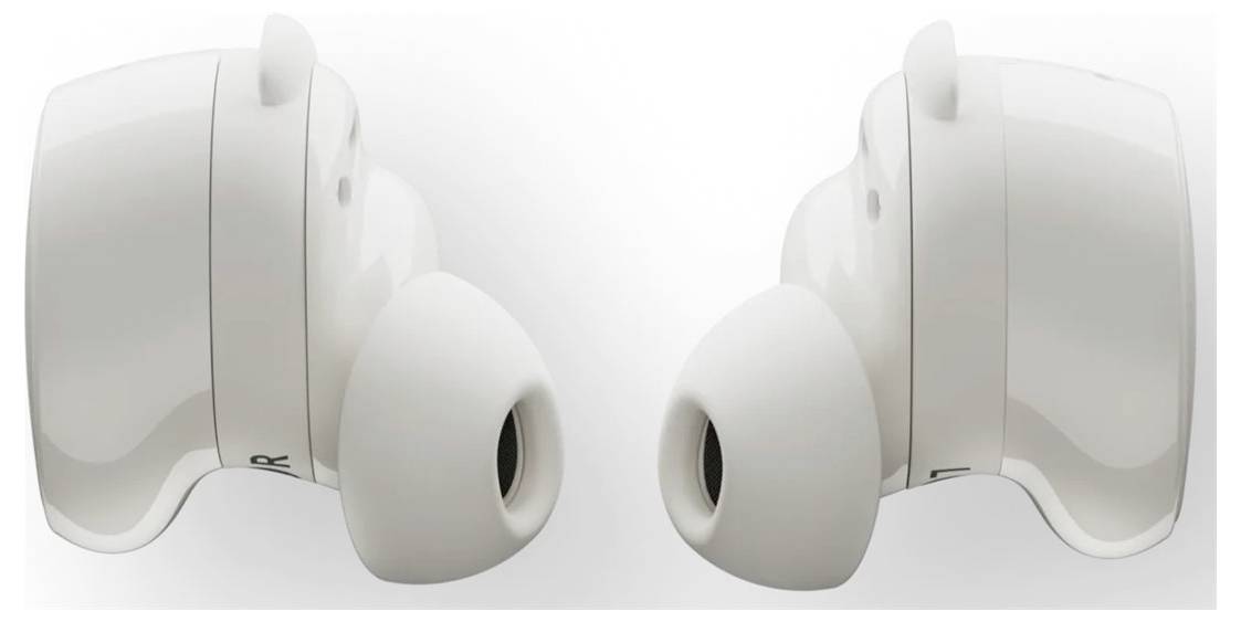 Une paire d'écouteurs sans fil blancs face à face, mettant en valeur leur design ergonomique et leurs embouts intra-auriculaires.