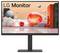 Écran LG avec un support moderne, affichant une scène 3D futuriste avec des sphères colorées et des formes abstraites sur un ciel orange.