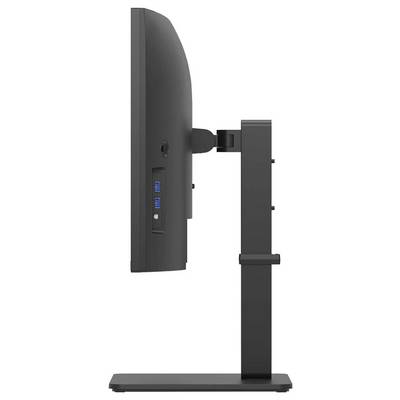 Vue latérale d'un moniteur d'ordinateur noir sur un support, montrant des ports USB pour un accès facile. Le moniteur est fin et réglable.