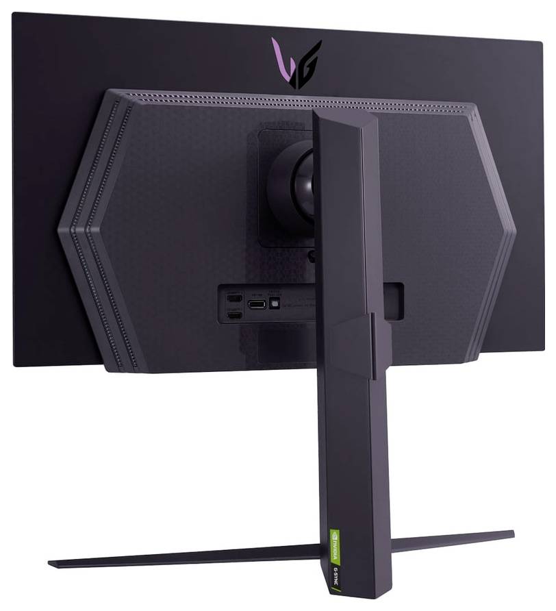 Vue arrière d'un moniteur noir élégant avec un design hexagonal autour du support, présentant plusieurs ports dont USB et HDMI.
