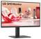 Écran QHD de LG affiché sur un arrière-plan abstrait et vibrant avec des formes et des textures rouges et blanches.