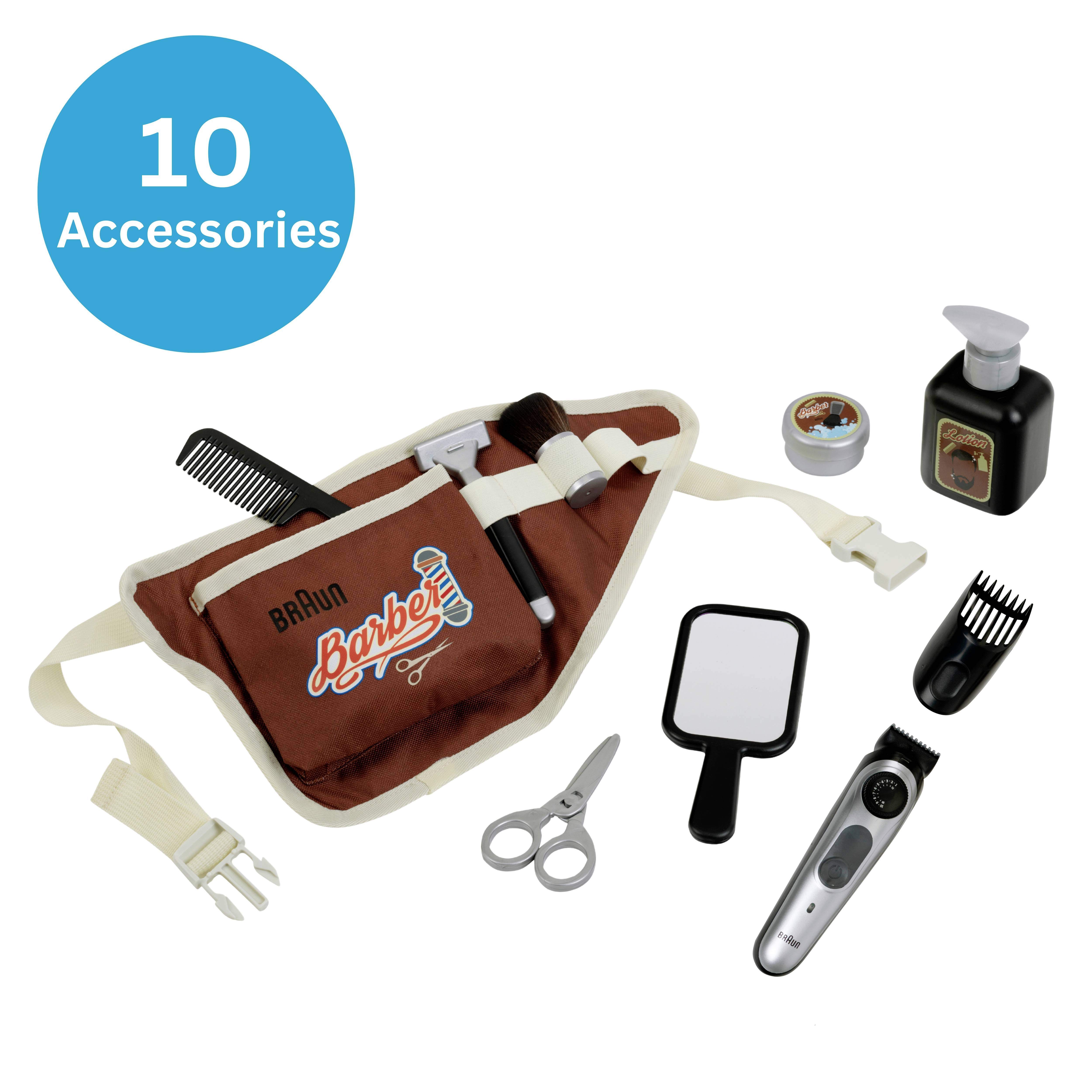 Un ensemble de 10 accessoires de coiffure pour enfants comprenant des ciseaux, un peigne, une tondeuse et un miroir disposés autour d'une pochette de taille marron étiquetée 'Barbier'.
