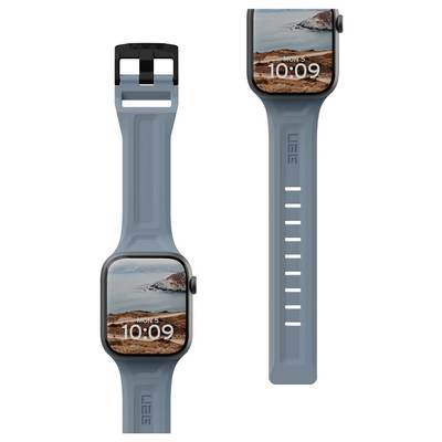 Montre connectée moderne avec un bracelet bleu, affichant 'Lundi 5' à 10h09, sur un fond d'écran de côte.