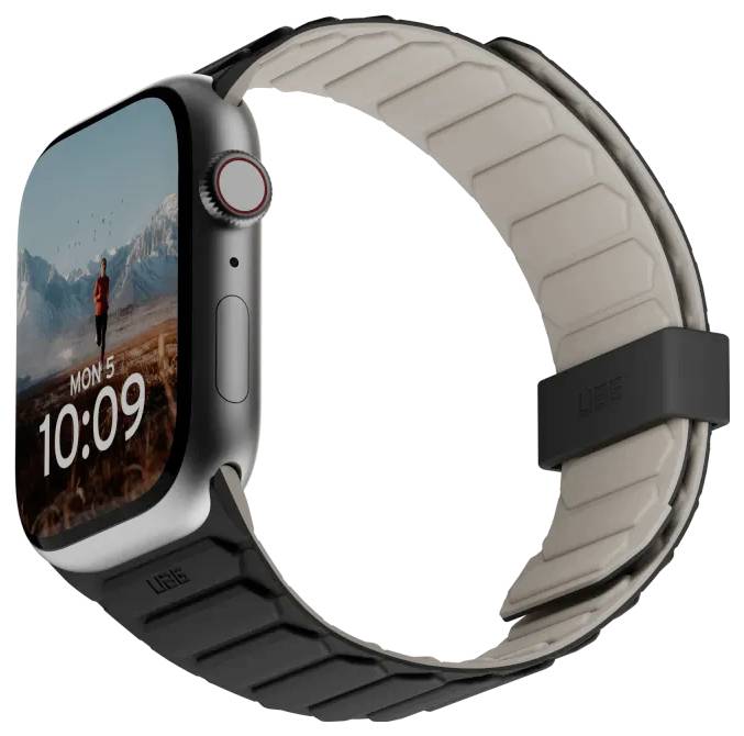 Une montre connectée avec un grand écran affichant l'heure '10:09' et la date 'Lun 5'. Le bracelet est noir et blanc avec un motif texturé.