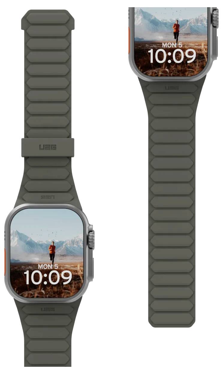 Montre connectée avec bracelet robuste gris affichant l'heure '10:09' et la date 'Lun 5'. En arrière-plan, une personne est visible dans un paysage montagneux.