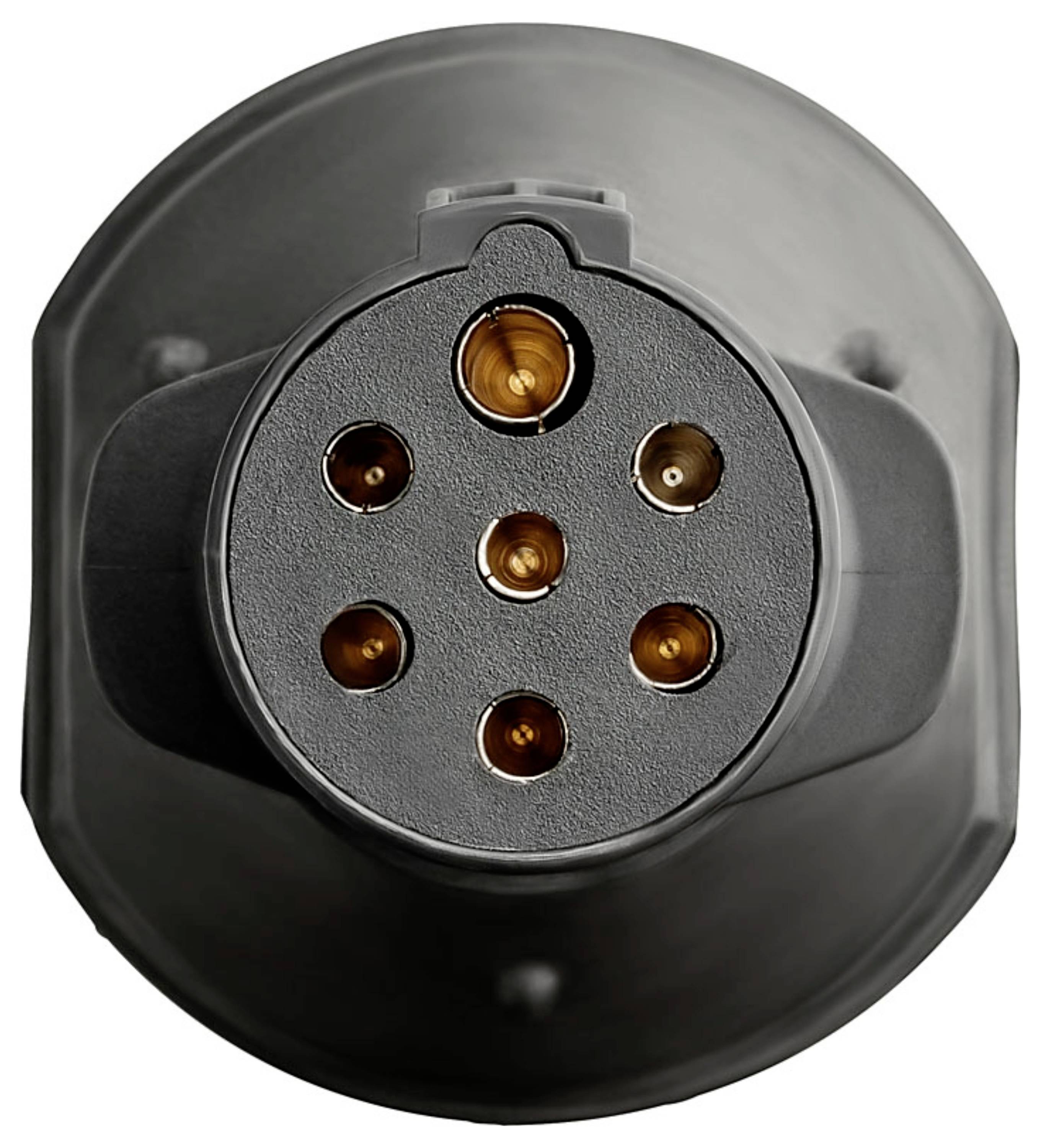 Une image en gros plan d'une prise de charge de véhicule électrique avec sept broches circulaires, conçue pour se connecter à une station de recharge.