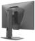 Un moniteur MSI noir est présenté de dos, mettant en valeur son support inclinable et son design élégant.