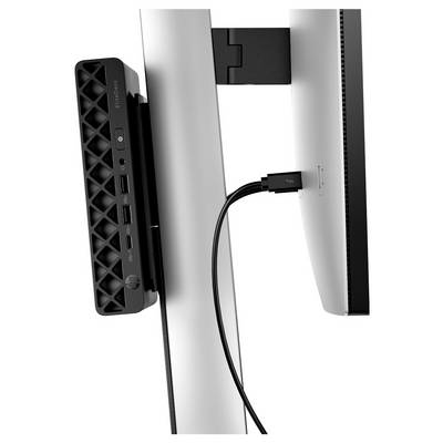 Station d'accueil verticale compacte fixée à l'arrière d'un moniteur, dotée de plusieurs ports de connectivité, avec un câble USB inséré.