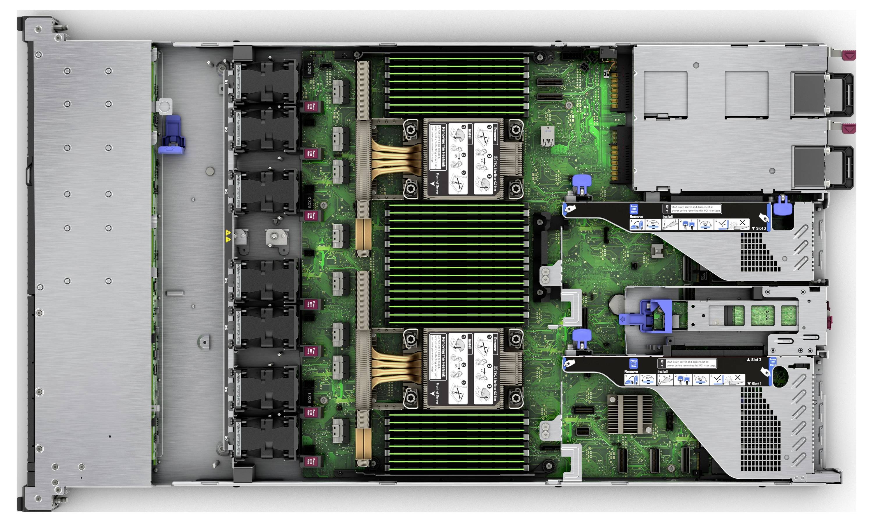 Vue de dessus de l'intérieur d'un serveur informatique, montrant des processeurs doubles, des modules de RAM, des ventilateurs de refroidissement et des baies de stockage sur une carte de circuit imprimé verte.