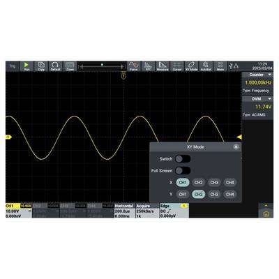 Un écran d'oscilloscope numérique affiche une onde sinusoïdale jaune sur une grille noire avec un panneau de contrôle des paramètres pour le 'Mode XY'. La fréquence indique '1,000 kHz'.